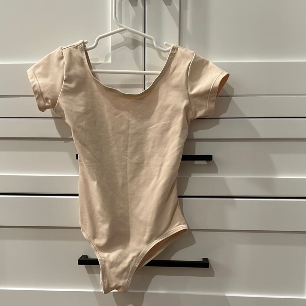 Eloquii Cream Bodysuit with Cap Sleeves. True size 6